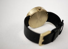 Load image into Gallery viewer, Tube watch D42 brass with black leather strap
